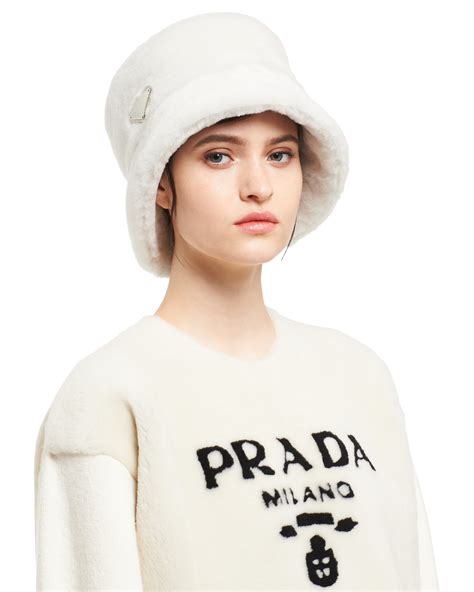 prada white shearling bucket hat|Prada fluffy hat.